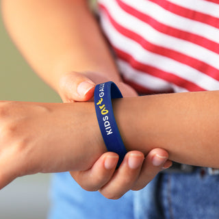 Kids Silicone Wrist Band - Debossed (Black) — Feature